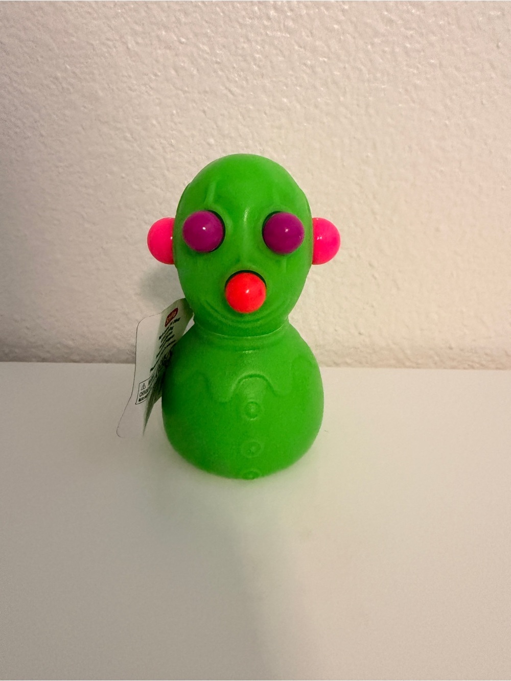 NeeDoh Bright Green Sensory SqueezeToy with Pink & Purple Details